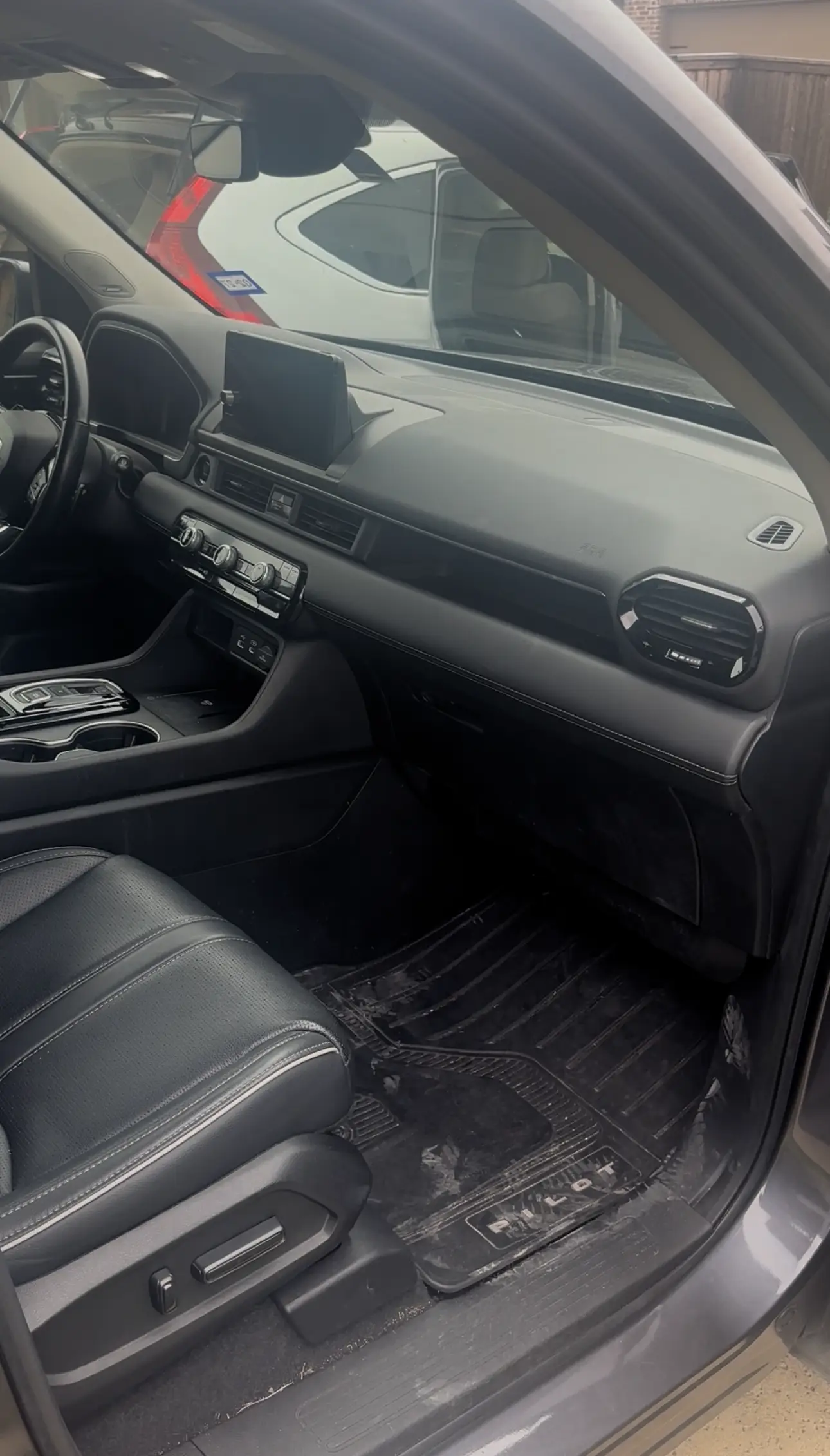 Vehicle interior before mobile detailing