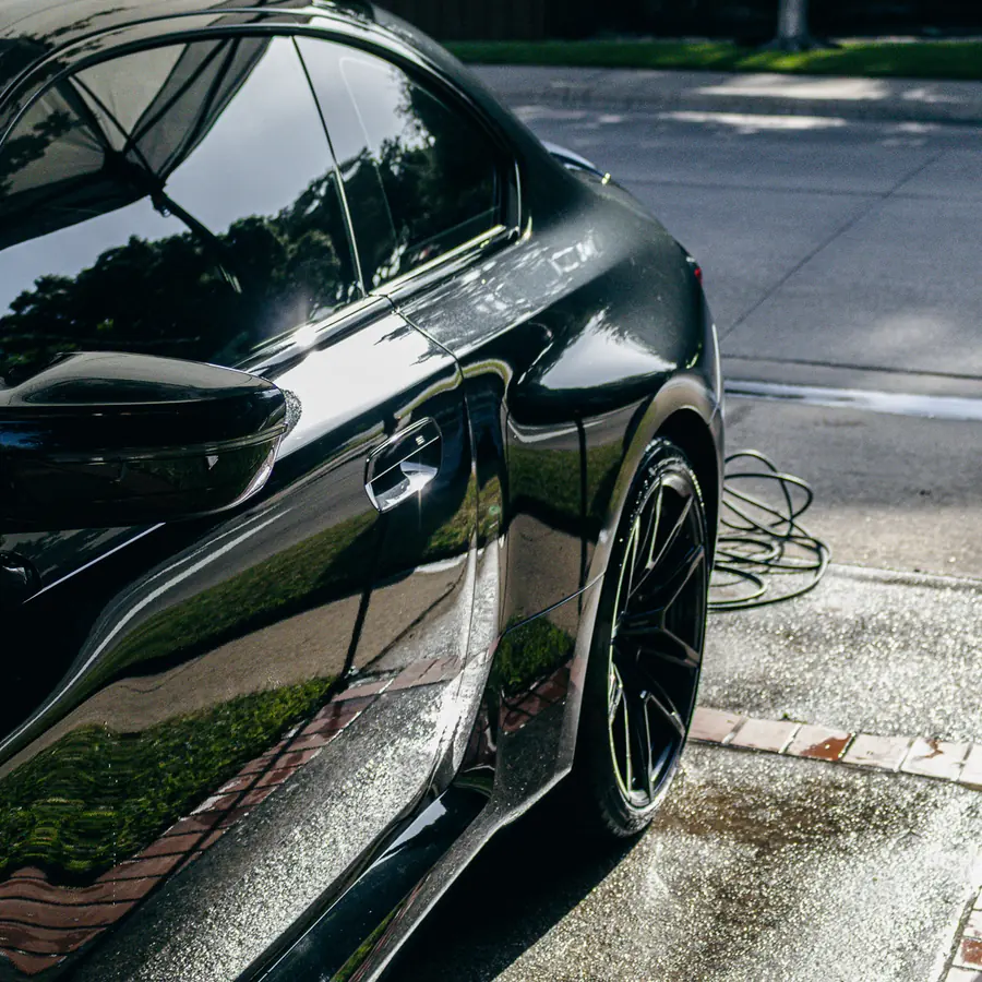 Glossy blue BMW after an exterior detail