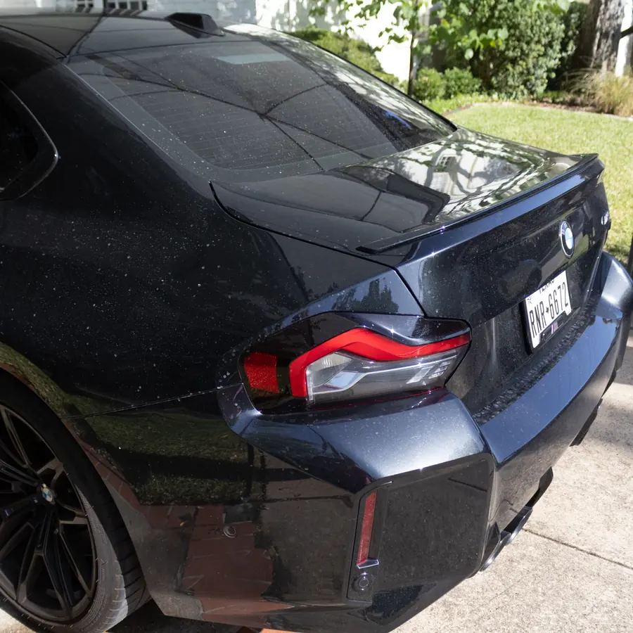 Blue BMW before an exterior mobile detail